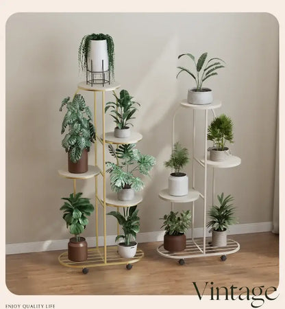Gold-toned metal multi-storey plant stand with wheels holding colorful ceramic pots for interior decor flower rack