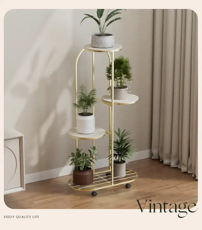 Gold metal plant stand with round white marble shelves and black caster wheels for interior decor flower rack
