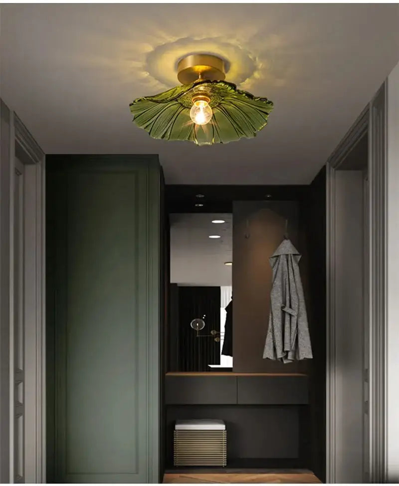 Green leaf-shaped glass ceiling light with brass fixture modern nordic e27 ceiling lights for home interiors by DecorBites
