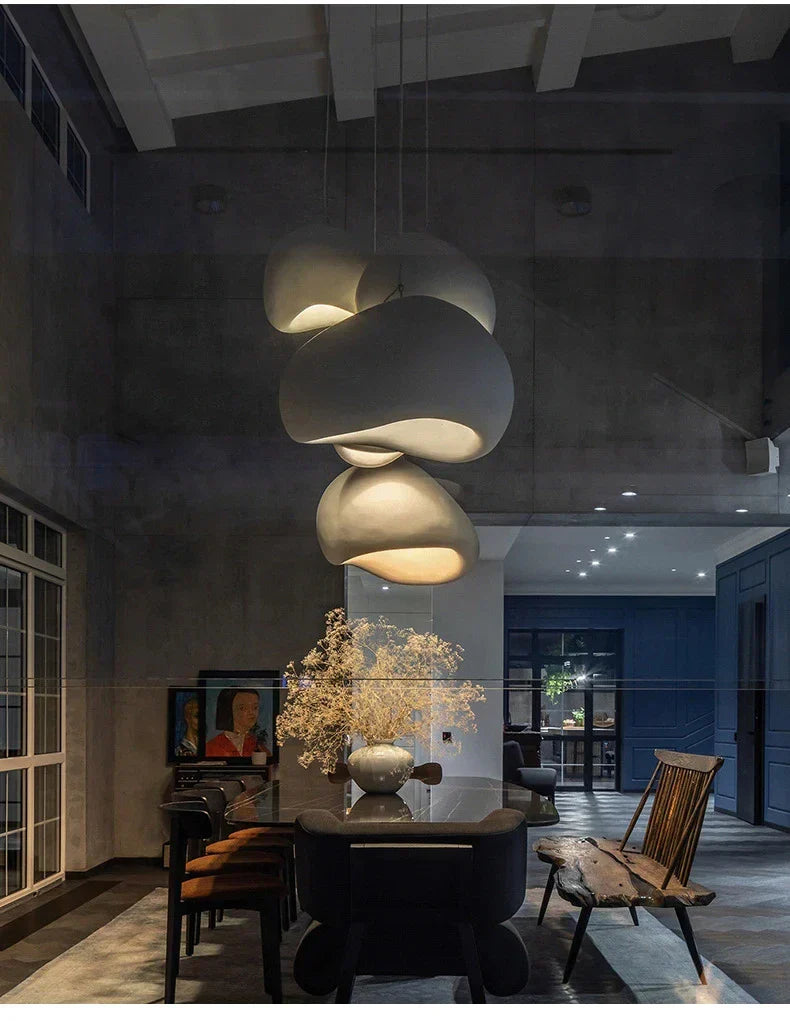DecorBites modern nordic chandelier with matte white ceramic layered cloud-like shades emits warm light for home and dining