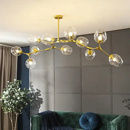 Gold-toned decorbites modern nordic glass chandelier with multiple clear glass globe shades for elegant lighting