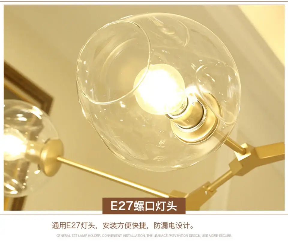 Clear glass globe glass chandelier with brass metal base and illuminated led e27 bulb for modern nordic glass decor