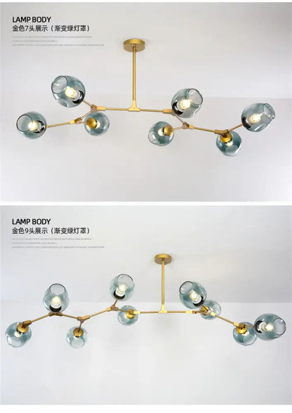 Gold-toned modern nordic glass chandelier with seven and nine teal glass globes in a branching nordic lustre design