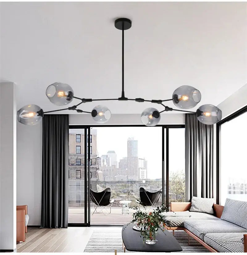 Modern black metal nordic glass chandelier with multiple frosted glass globe bulbs from DecorBites™ nordic lustre collection