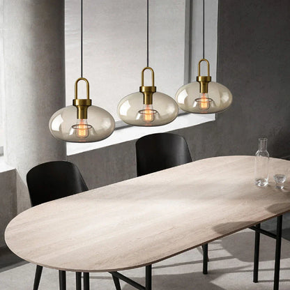 DecorBites modern nordic glass pendant light with brass metal and smoke-gray glass shades for kitchen and restaurant