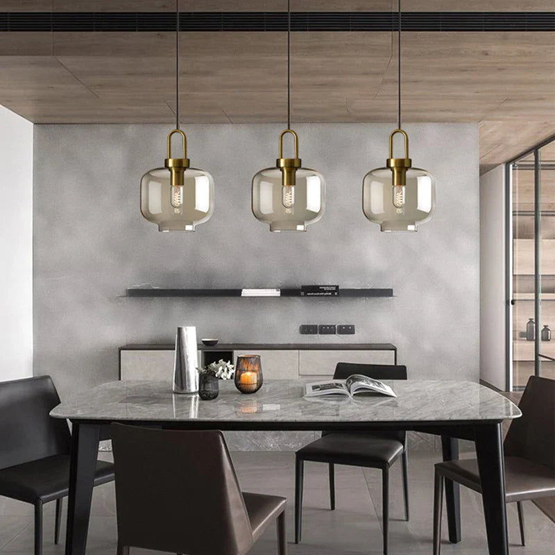 DecorBites modern nordic glass pendant light with brass fixtures and smoked glass shades for kitchen and restaurant use