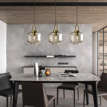 DecorBites modern nordic glass pendant light with brass fixtures and smoked glass shades for kitchen and restaurant use