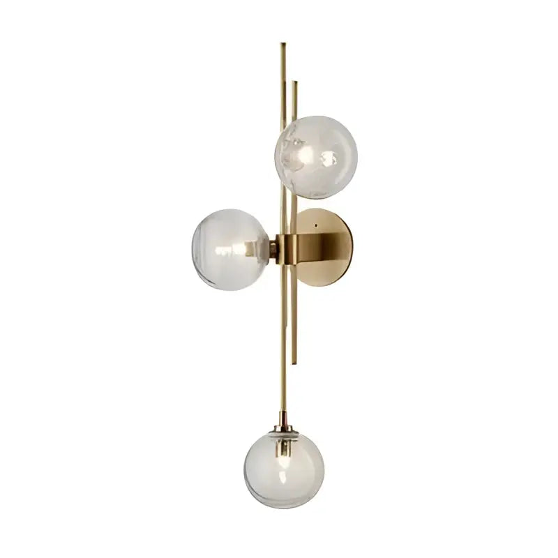DecorBites Modern Nordic wall sconce with brass finish and three clear textured glass globe shades green glass alternative