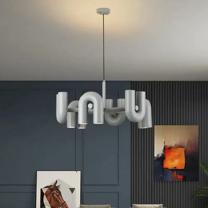 Decorbites modern nordic led ceiling chandelier in white with curved interconnected pipe segments for home lighting