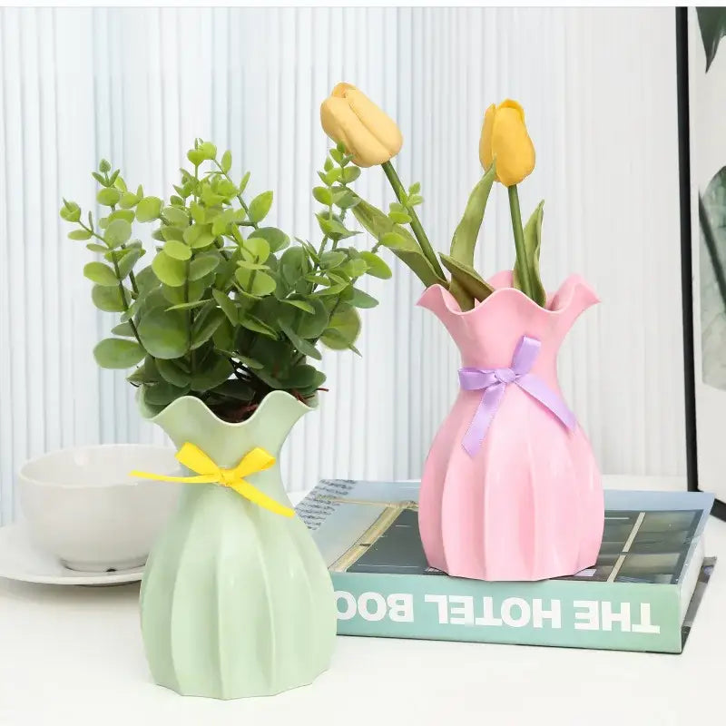 Pink ceramic ruffled top vase home accentuated with a lavender ribbon bow from decorbites modern nordic collection