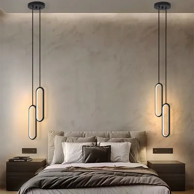 DecorBites™ modern nordic pendant light with black elongated oval design and warm LED illumination for home decoration