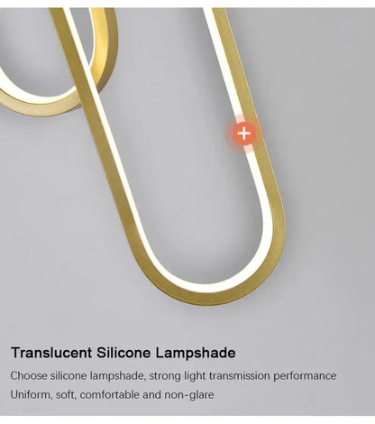 Gold-toned translucent silicone nordic pendant light with sleek curved design for modern home decoration