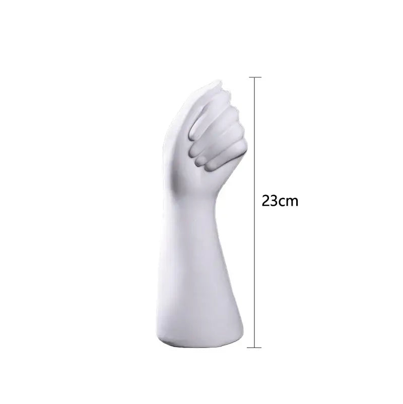 White ceramic sculpture hand vase 23cm tall featuring a modern nordic style design by DecorBites