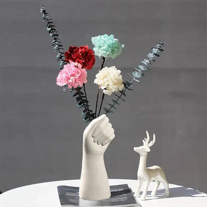 DecorBites™ modern nordic style white ceramic hand vase holding colorful artificial flowers for home decor
