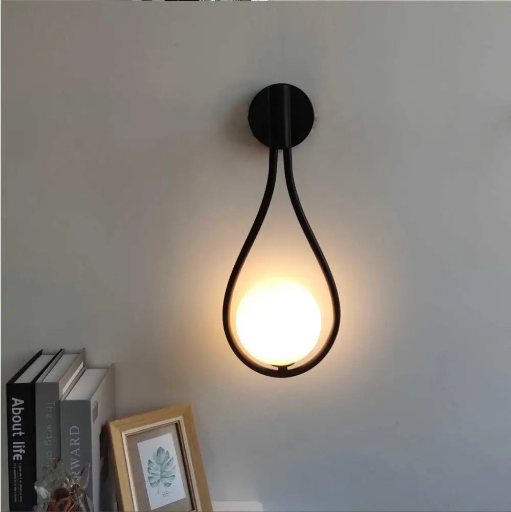 Black metal wall lamp decorbites™ modern nordic livi wall lamp with teardrop frame and warm glowing circular light
