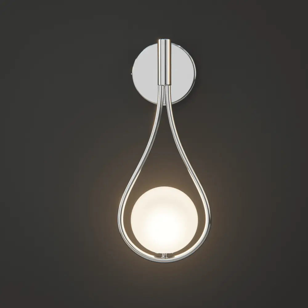 Modern chrome-finished decorbites™ livi wall lamp with teardrop frame and frosted glass globe bulb
