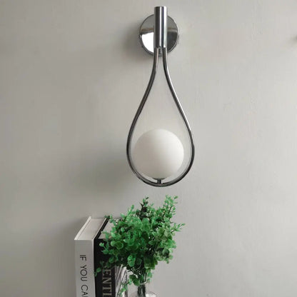 DecorBites™ modern nordic wall lamp with chrome finish teardrop frame and matte white spherical bulb, ideal livi wall lamp