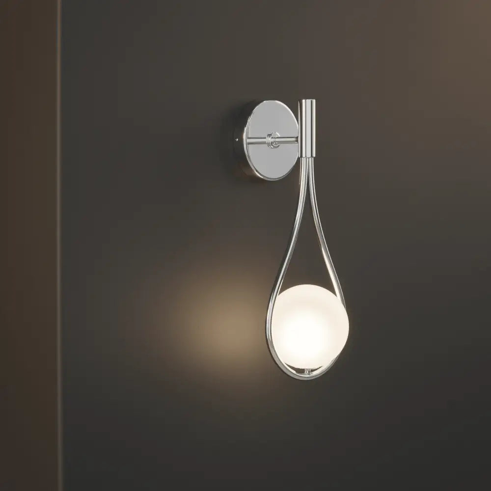 DecorBites™ modern Nordic wall lamp in chrome with a teardrop shape and frosted glass globe livi wall lamp