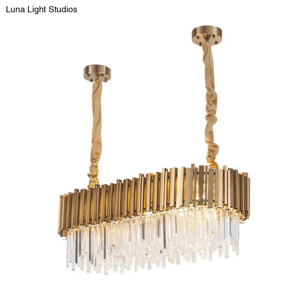 Gold-toned decorbites modern oblong island pendant lamp with vertical brass bars and cascading crystal rods