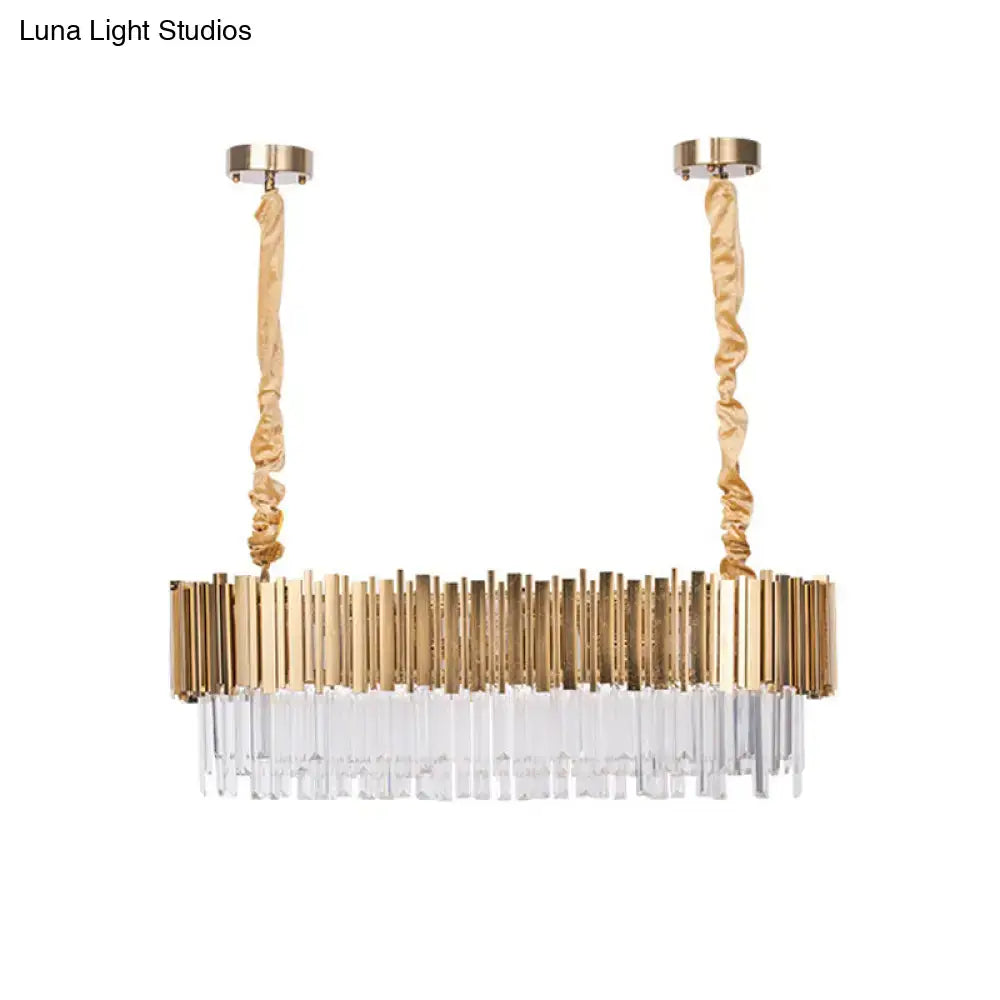 Gold-toned decorbites modern oblong island pendant lamp with crystal rods and twisted fabric cords in post-modern oblong island style