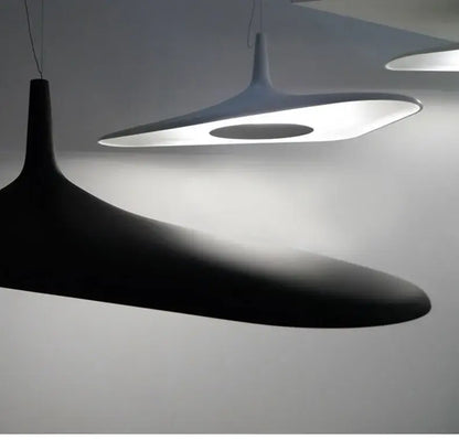 Black and white modern resin pendant lamp with sleek organic shapes for dining room changeable light by decorbites
