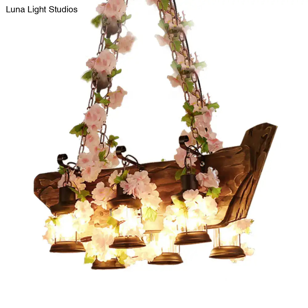 Rustic wooden pendant light with pink artificial flowers and hanging lanterns in industrial style e26 e27 design