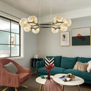 Modern glass globe chandelier pendant light with brass accents for living room by DecorBites™