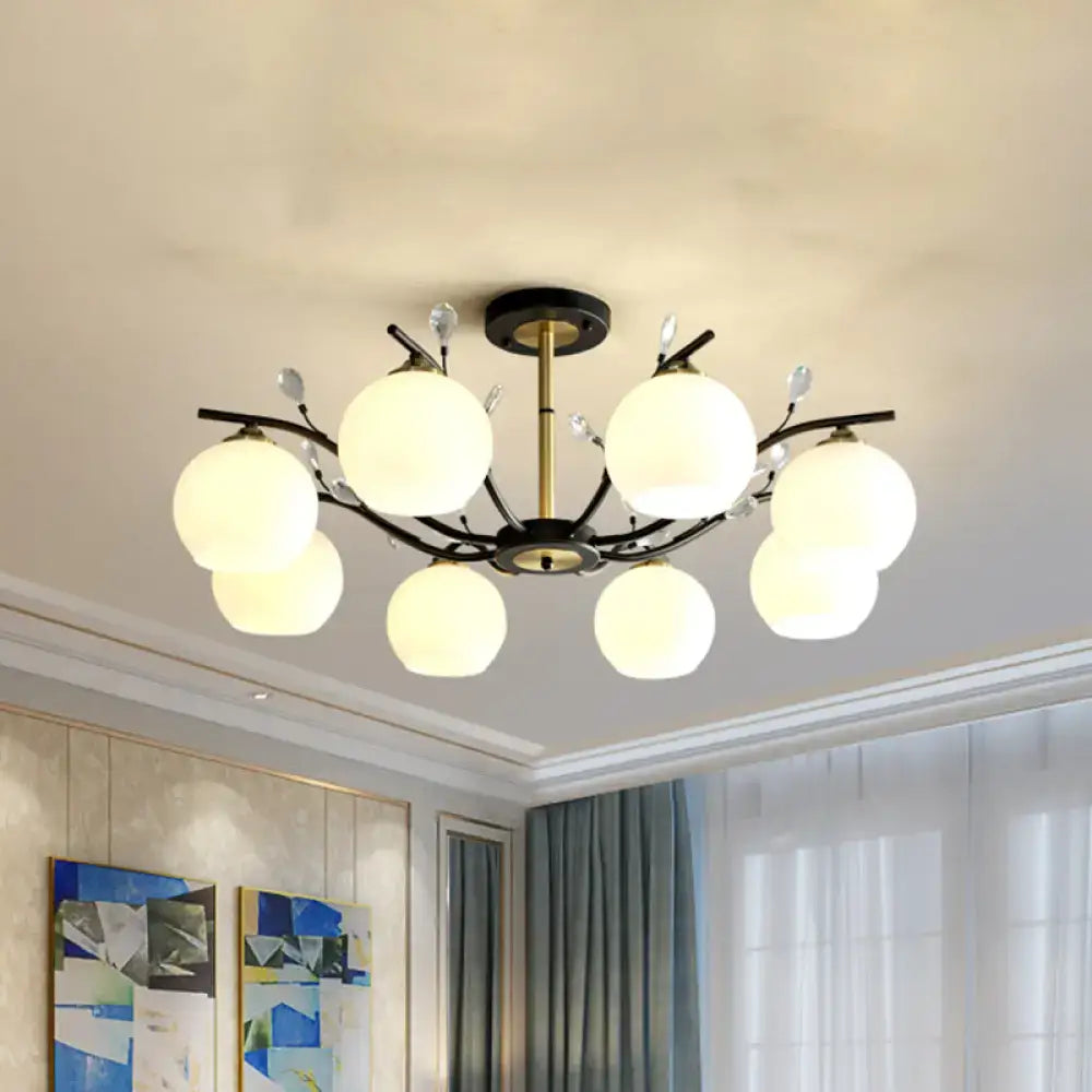 Decorbites modernist semi flush mount ceiling light with six cream clear glass globes and crystal accents on black frame