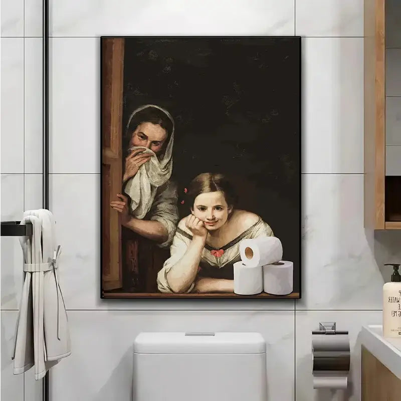 A framed canvas print of mona lisa bathroom wall art featuring two figures with white bathroom toilet paper rolls below
