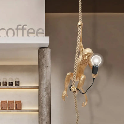 Decorbites™ monkey rope chandelier pendant light in gold with hemp rope and monkey decoration featuring an exposed bulb