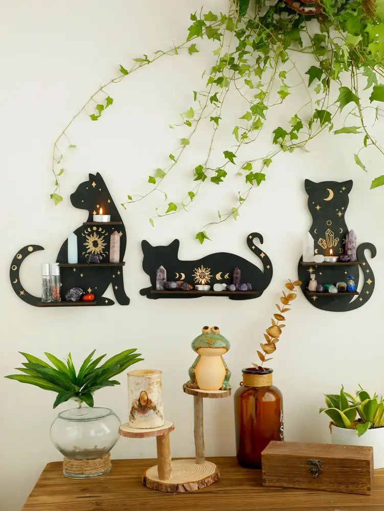 DecorBites™ moon phase black cat wooden shelf features intricate celestial cut-out designs with moons stars and suns