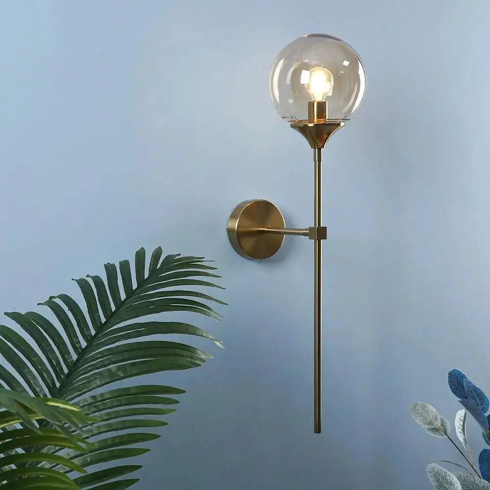 Decorbites™ moroccan glass wall sconce brass finished wall sconce with spherical glass globe and exposed bulb