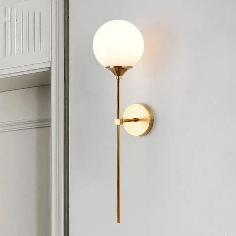 DecorBites™ moroccan glass wall sconce in gold tone with frosted glass globe and slender rod for elegant lighting