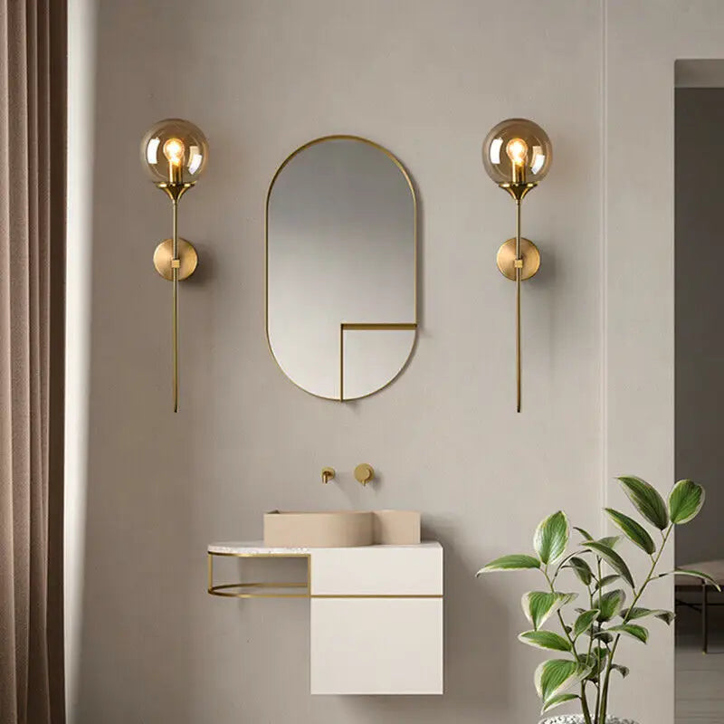 Decorbites™ moroccan glass wall sconce with gold-toned spherical wall sconce and exposed filament bulbs