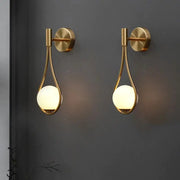 Decorbites™ moroccan gold modern nordic wall lamp with gold-toned metal frame and warm-glowing spherical glass shades