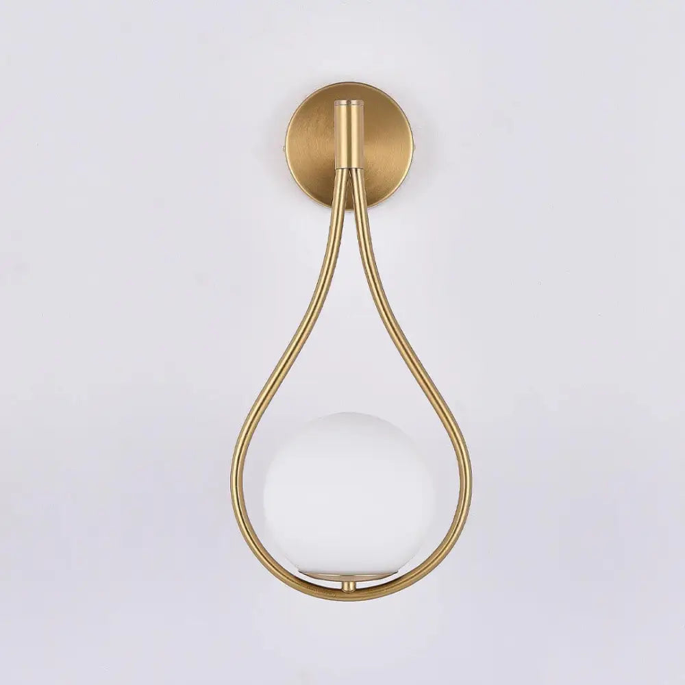 Gold-toned teardrop wall lamp with frosted glass globe for modern nordic wall lamp by DecorBites™