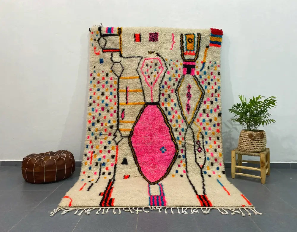 DecorBites moroccan handmade azilal rug cream with bold pink red blue yellow geometric woolen texture and fringed edges