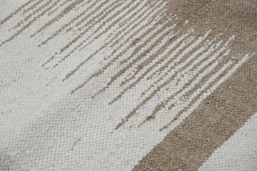 Beige and off-white woven moroccan handmade azilal rug with diagonal striped pattern 300x200cm by decorbites