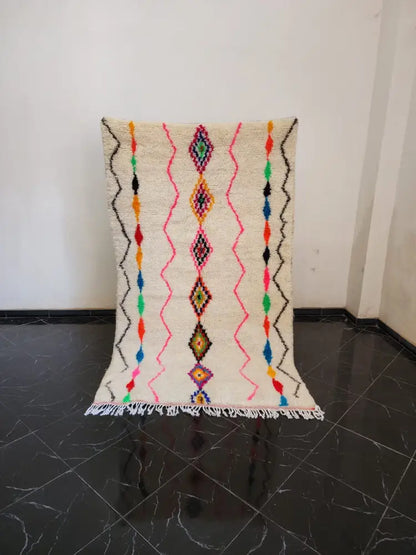 Decorbites™ moroccan handmade azilal berber carpet in cream with bold geometric patterns and fringe supporting sustainable practices