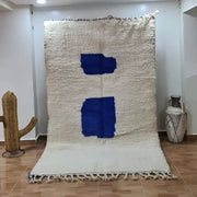 DecorBites™ handcrafted moroccan rug with natural cream background bold blue geometric patterns and fringed edges 2.5m x 1.5m