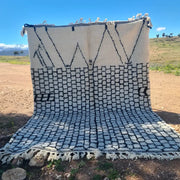 Beige and black geometric-patterned moroccan handmade beni ouarain rug 3m x 2m by skilled artisans with fringed edges