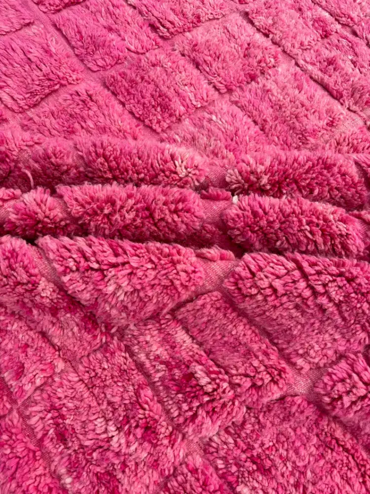 Vibrant fuchsia plush fabric with raised diamond-patterned texture in moroccan handmade beni ourain rug decorbites 3m x 2m