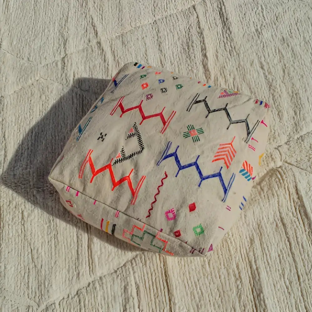 Beige decorbites™ moroccan handmade beniourain pouf with colorful geometric embroidery in natural wool