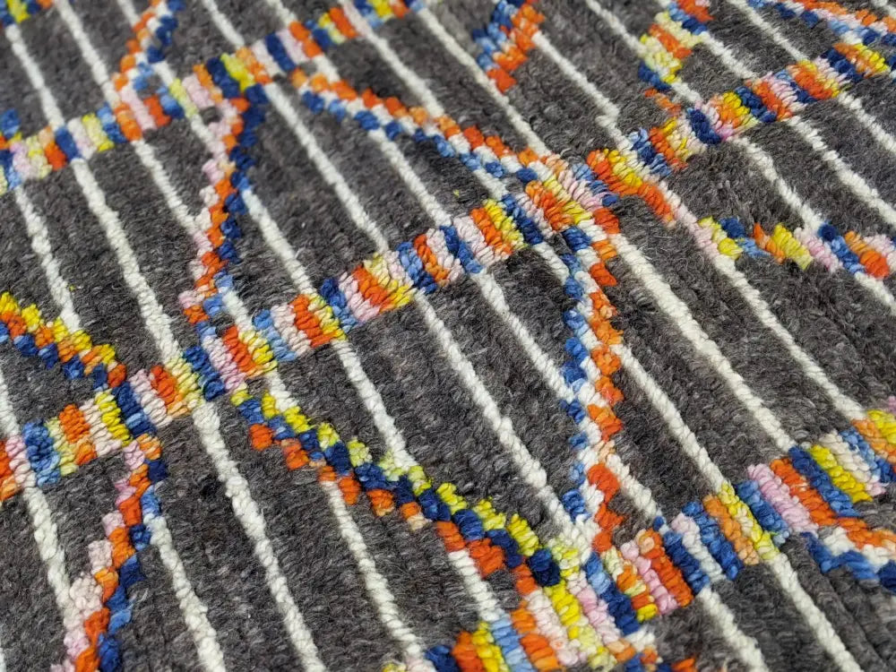 Decorbites moroccan handmade azilal rug in pure natural wool with bold geometric patterns in orange blue yellow and white