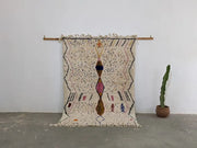 Beige moroccan handmade traditional azilal rug with geometric black pink and brown patterns 246 x 166 cm by DecorBites