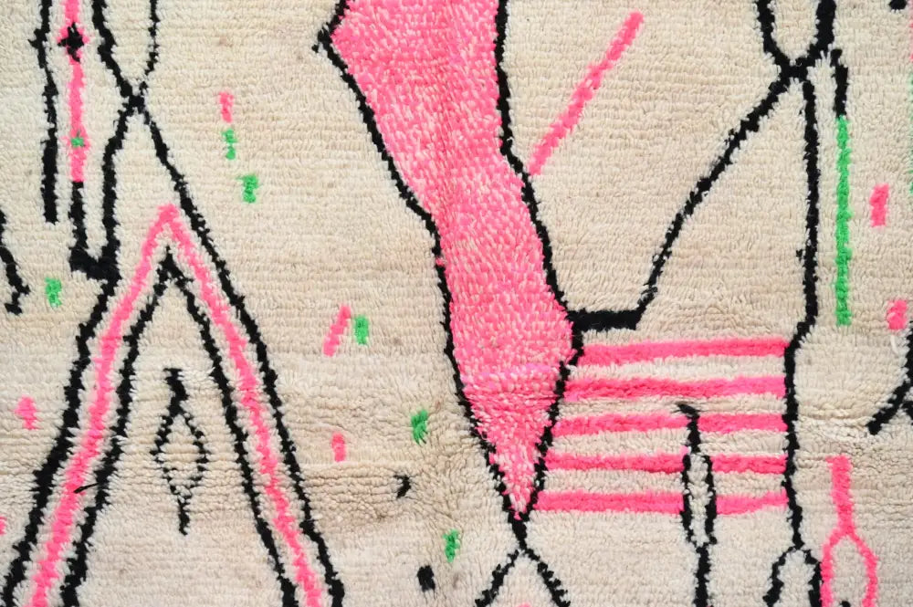 Beige moroccan handmade traditional azilal rug with bold pink black and green geometric patterns 256 x 136 cm