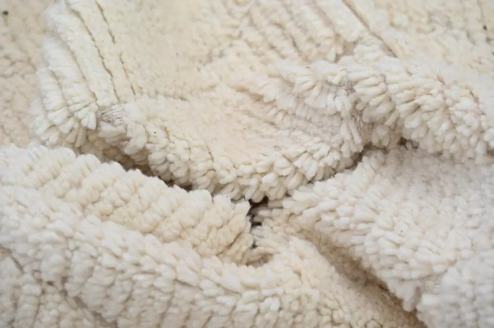 Cream-colored plush fleece fabric with soft texture on the decorbites™ moroccan handmade traditional azilal rug 256 x 157 cm