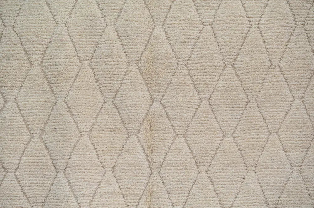 Beige moroccan handmade traditional azilal rug with textured diamond pattern by decorbites 256 x 157 cm