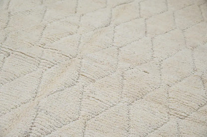 Cream-colored plush moroccan handmade traditional azilal rug with textured diamond pattern 256 x 157 cm