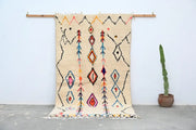 Beige DecorBites™ moroccan handmade traditional azilal rug with colorful black orange pink and blue geometric patterns 260 x 145 cm